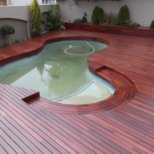 Red Iron bark decking installed with EasyClips around pool by Timbermann
